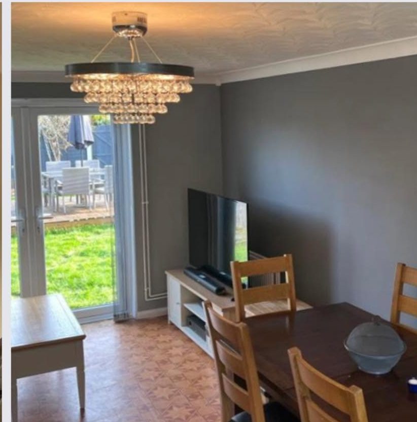 Living room after: smooth modern grey walls